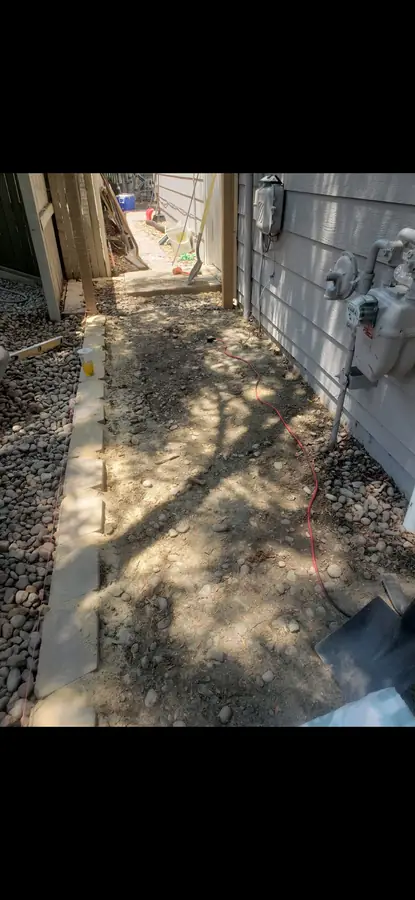 Side walkway before paver installation — prep work
